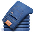 SHAN BAO 2022 autumn spring fitted straight stretch denim jeans classic style badge youth men's business casual jeans trousers