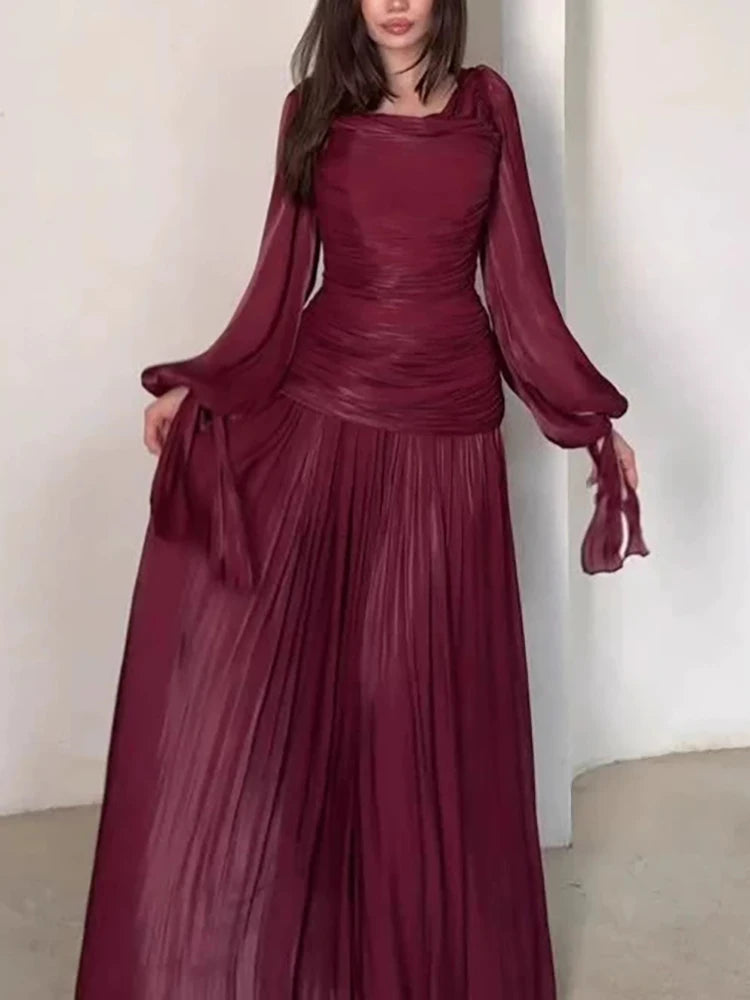 Casual round neck long sleeved pleated design dress with temperament satin high waisted spring and autumn new fashionable dress
